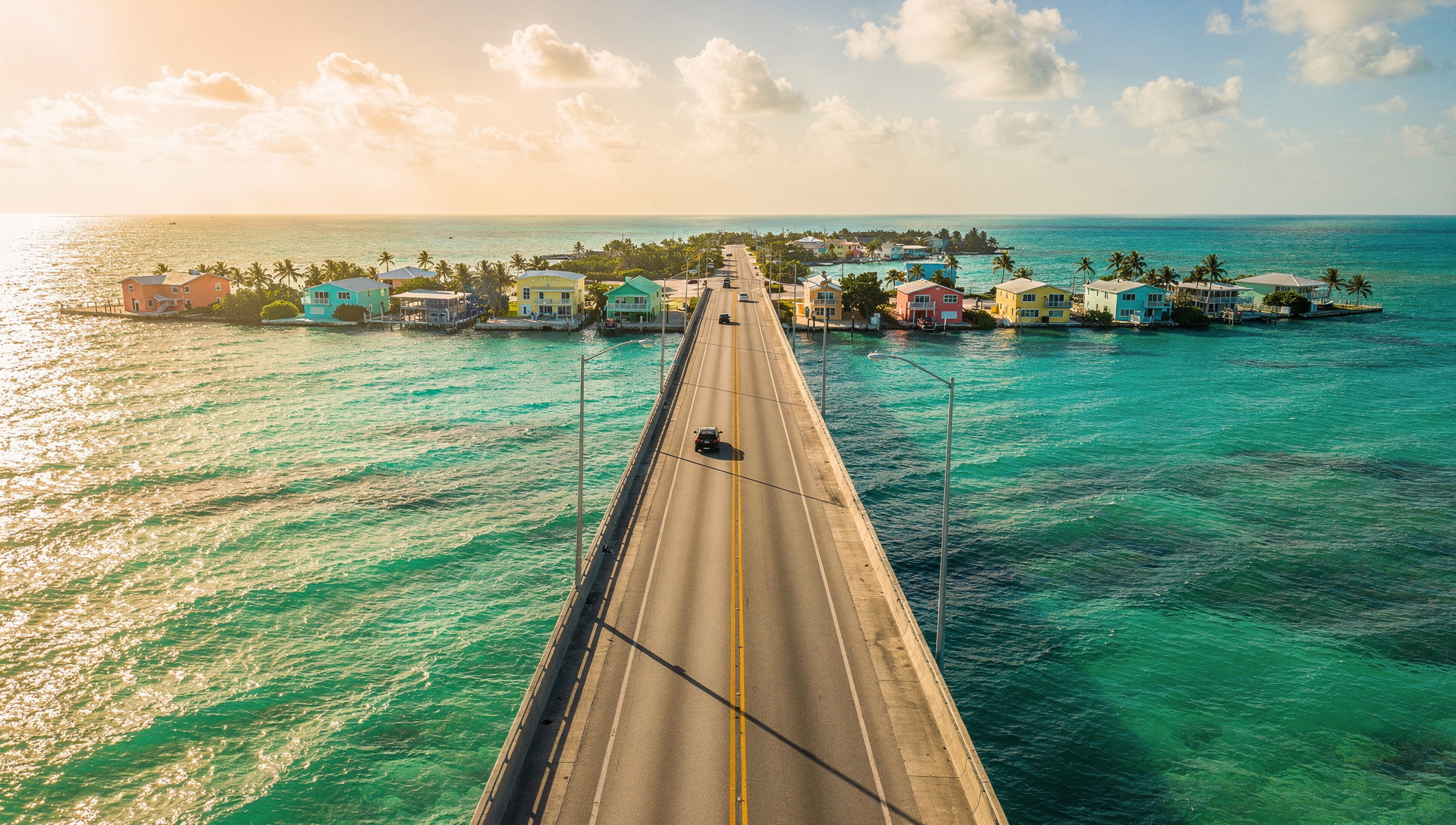 Florida coastal road trip passing beach homes and palm trees