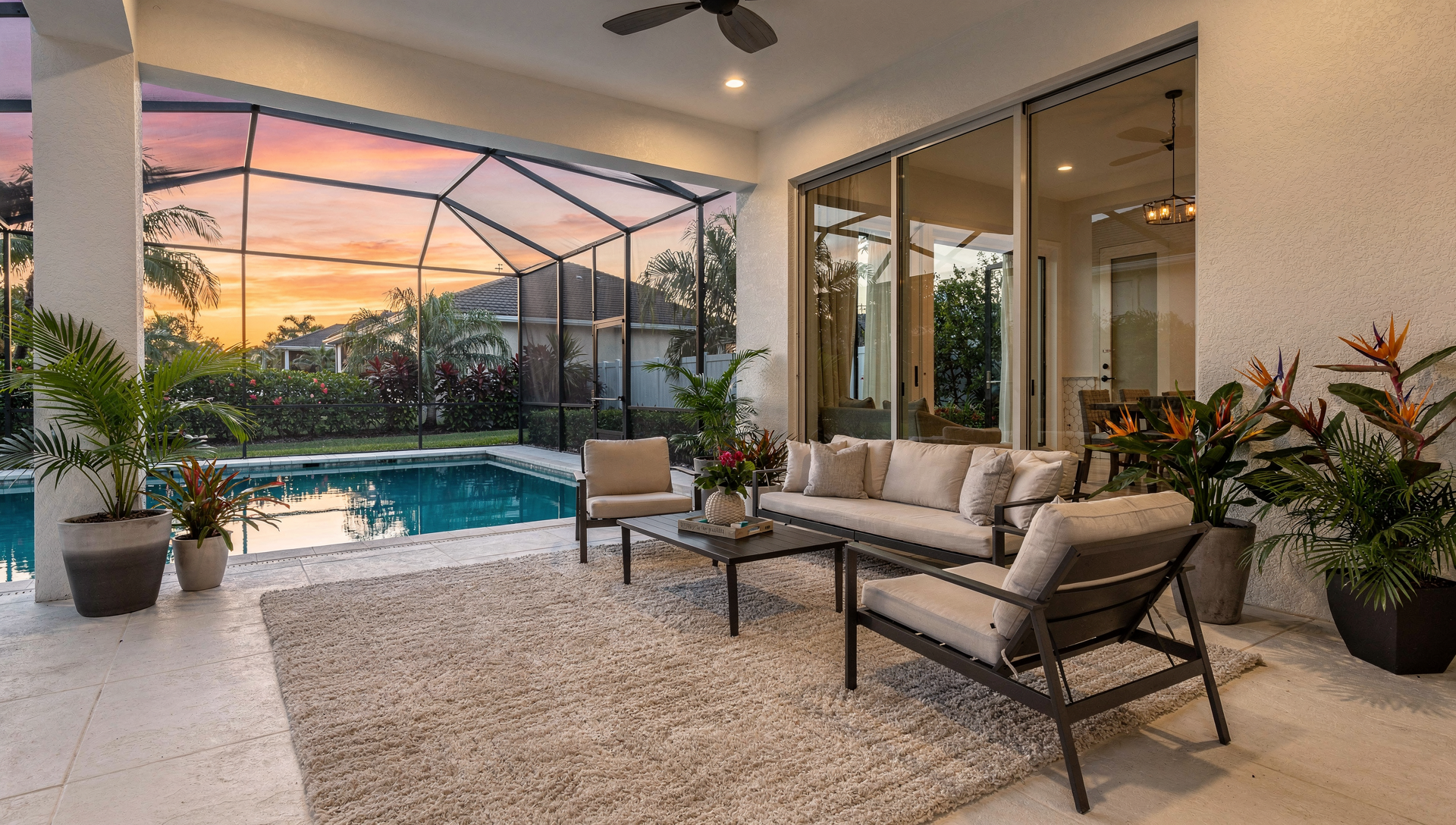 Staged Florida lanai with patio seating for outdoor living lifestyle